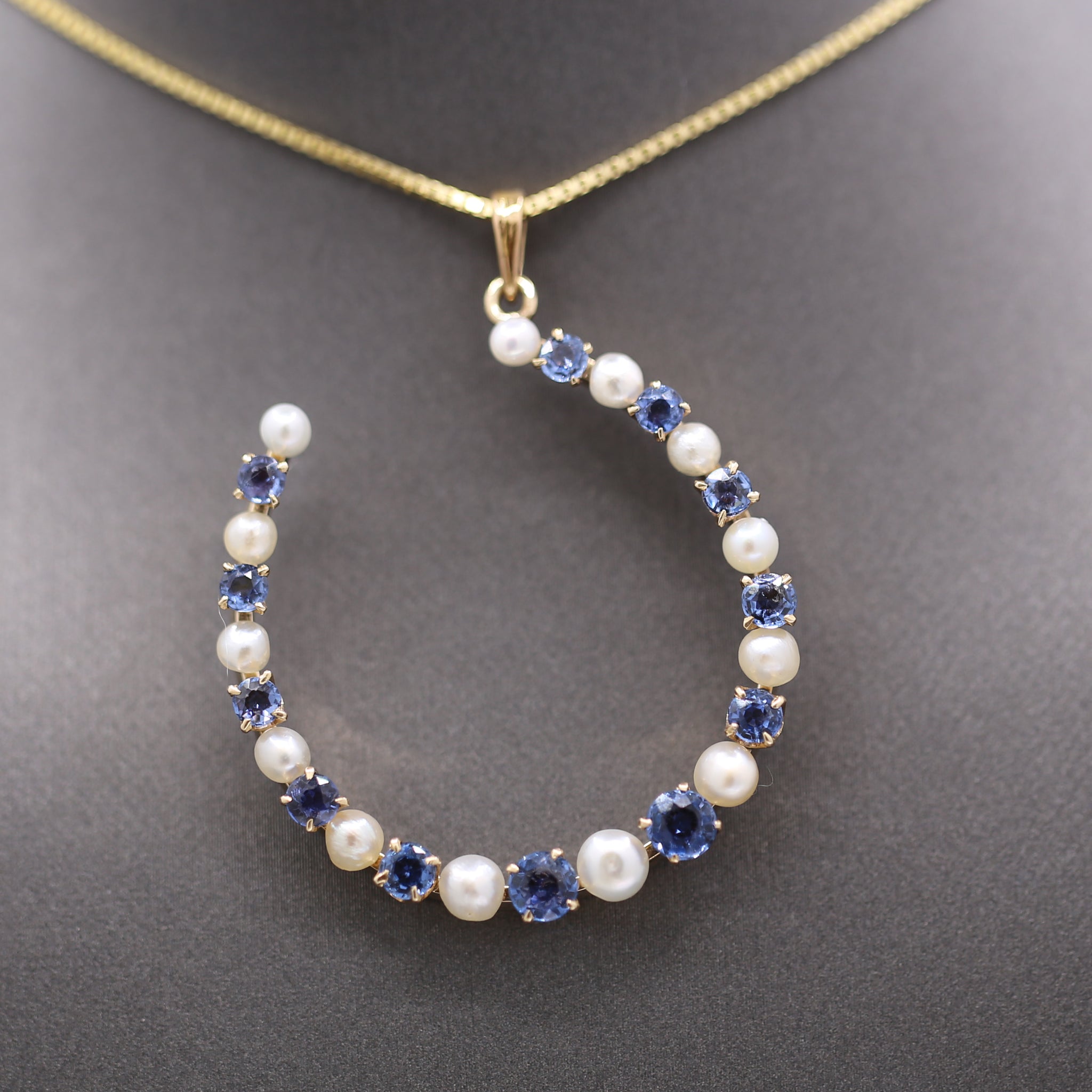 Victorian Yogo Montana Blue Sapphire and Pearl Horseshoe Good Luck Pendant in 14k