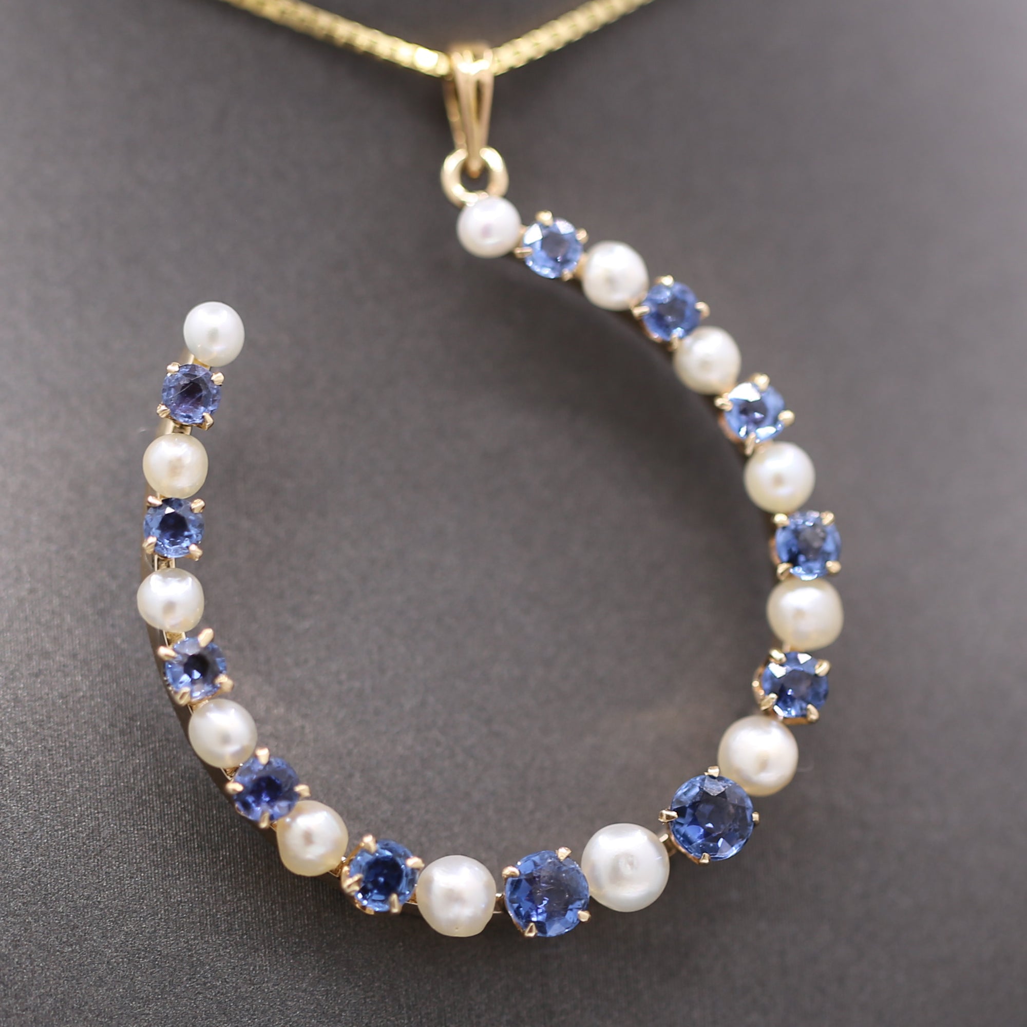 Victorian Yogo Montana Blue Sapphire and Pearl Horseshoe Good Luck Pendant in 14k