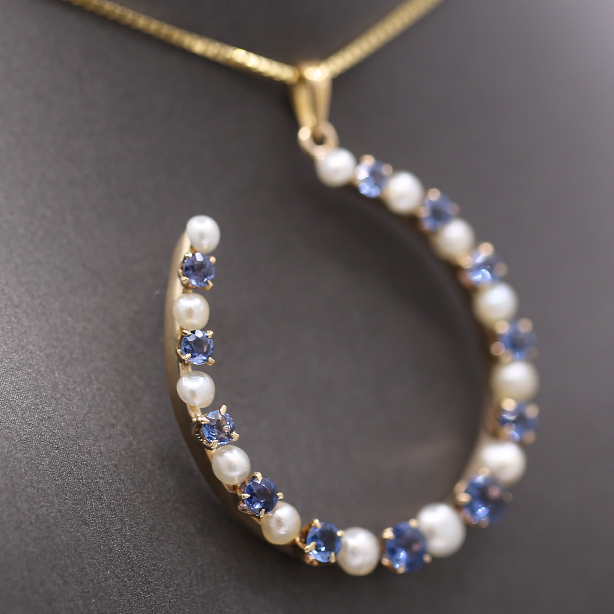 Victorian Yogo Montana Blue Sapphire and Pearl Horseshoe Good Luck Pendant in 14k