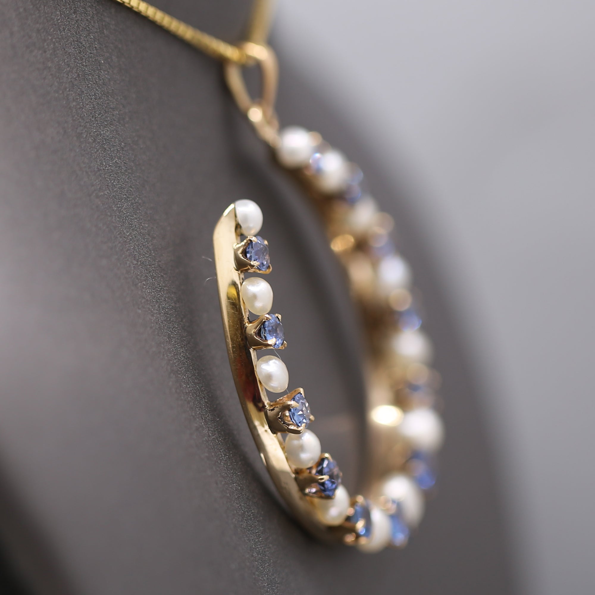 Victorian Yogo Montana Blue Sapphire and Pearl Horseshoe Good Luck Pendant in 14k