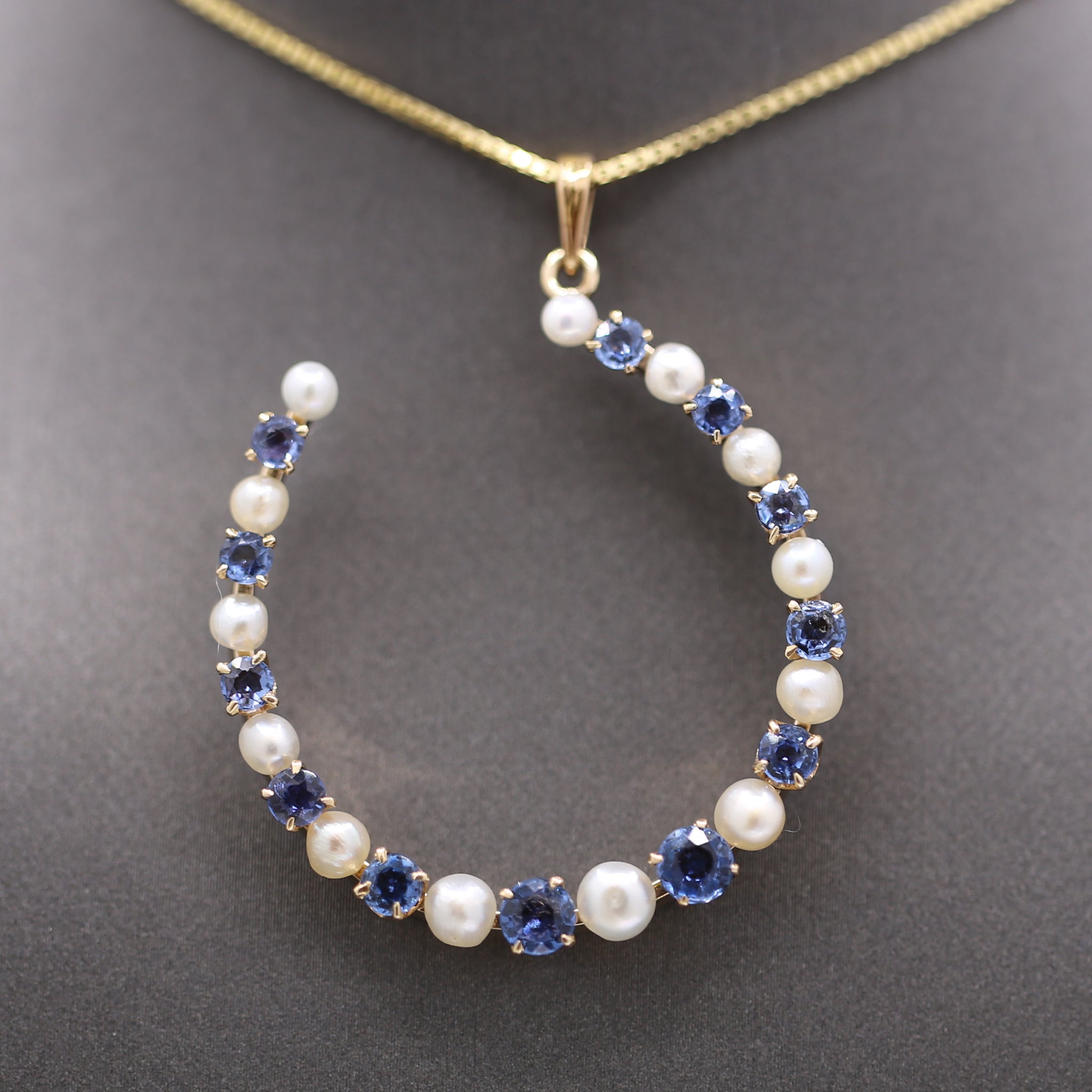 Victorian Yogo Montana Blue Sapphire and Pearl Horseshoe Good Luck Pendant in 14k