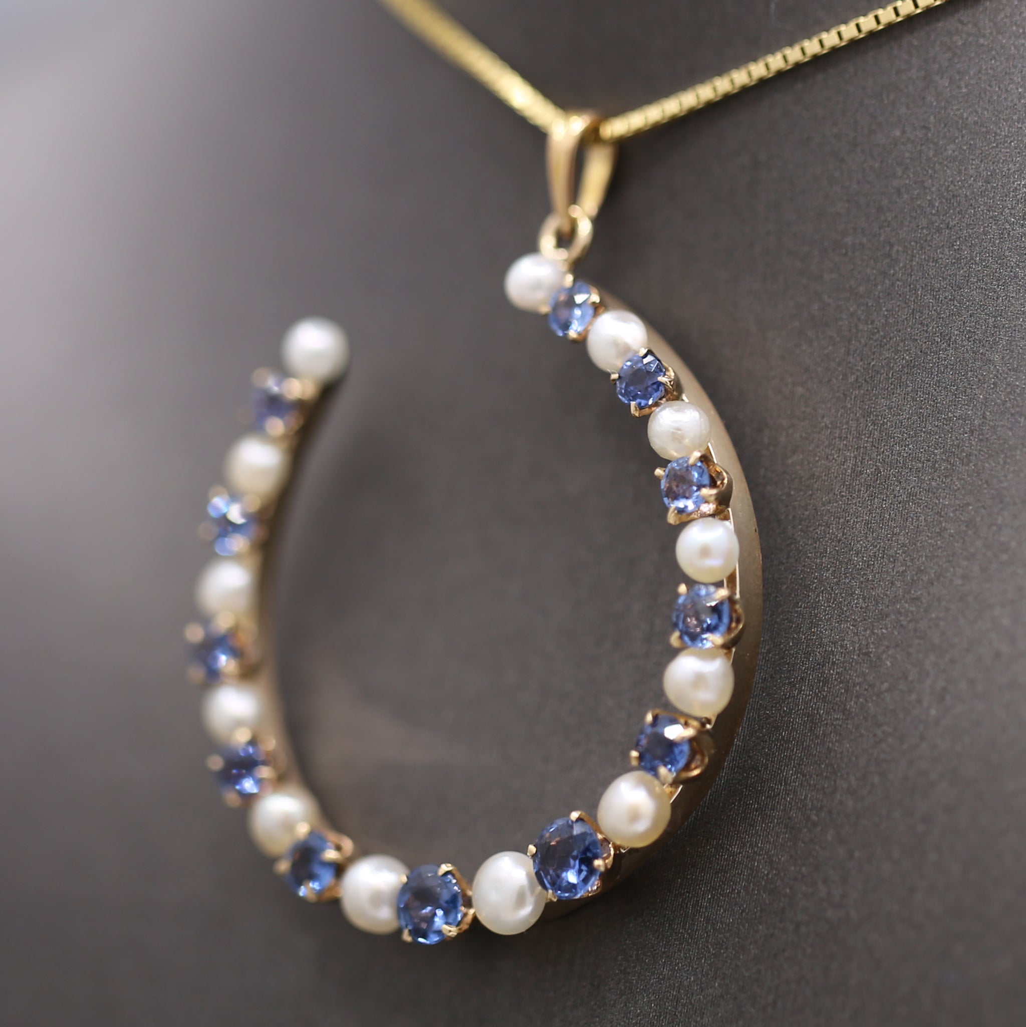 Victorian Yogo Montana Blue Sapphire and Pearl Horseshoe Good Luck Pendant in 14k