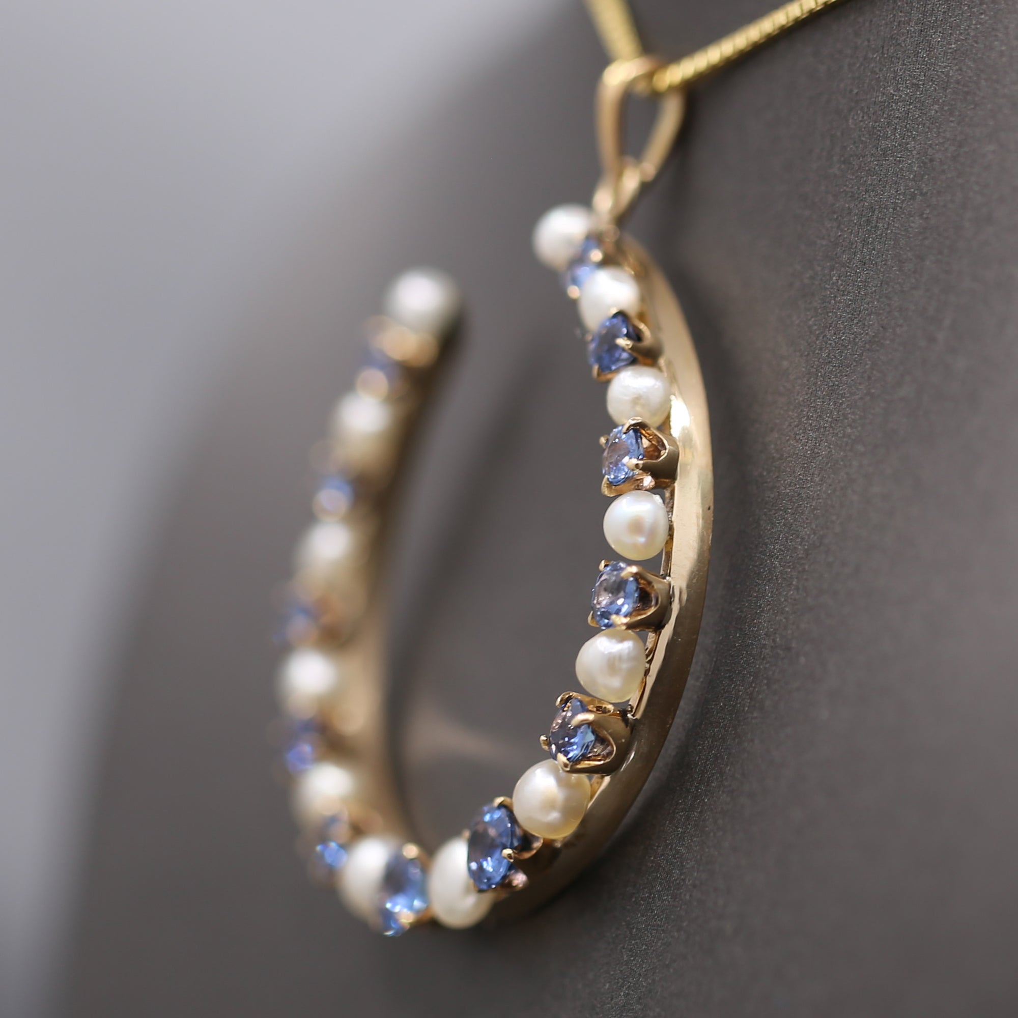 Victorian Yogo Montana Blue Sapphire and Pearl Horseshoe Good Luck Pendant in 14k