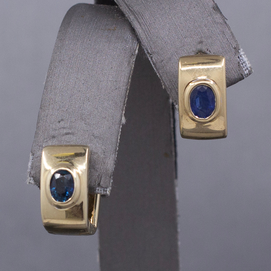 Vintage Bezel Set Blue Sapphire Huggie Hoop Earrings in 14k Yellow Gold