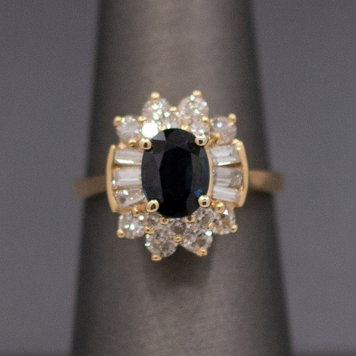 Midnight Blue Sapphire with Round and Baguette Cut Diamonds Ring in 14k Yellow Gold