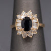 Midnight Blue Sapphire with Round and Baguette Cut Diamonds Ring in 14k Yellow Gold