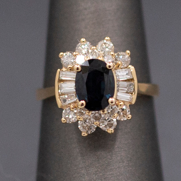 Midnight Blue Sapphire with Round and Baguette Cut Diamonds Ring in 14k Yellow Gold