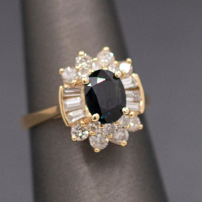 Midnight Blue Sapphire with Round and Baguette Cut Diamonds Ring in 14k Yellow Gold