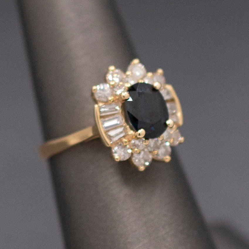Midnight Blue Sapphire with Round and Baguette Cut Diamonds Ring in 14k Yellow Gold