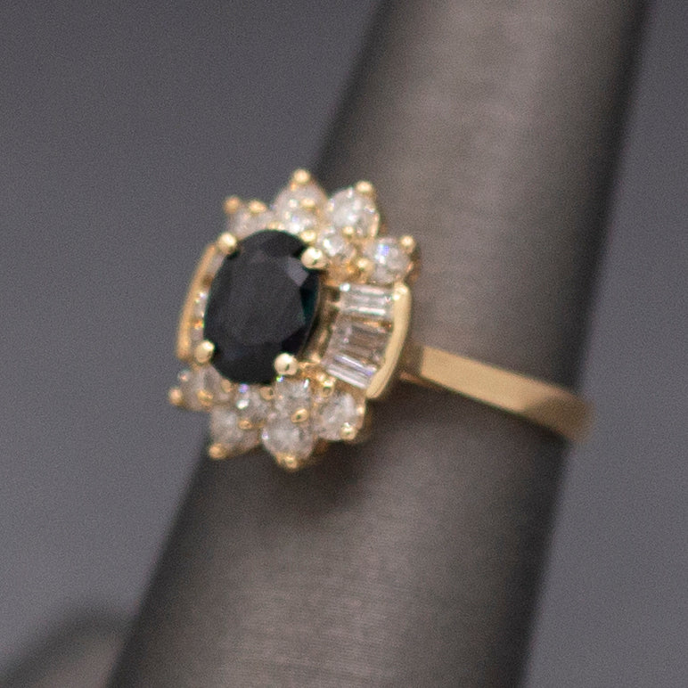 Midnight Blue Sapphire with Round and Baguette Cut Diamonds Ring in 14k Yellow Gold