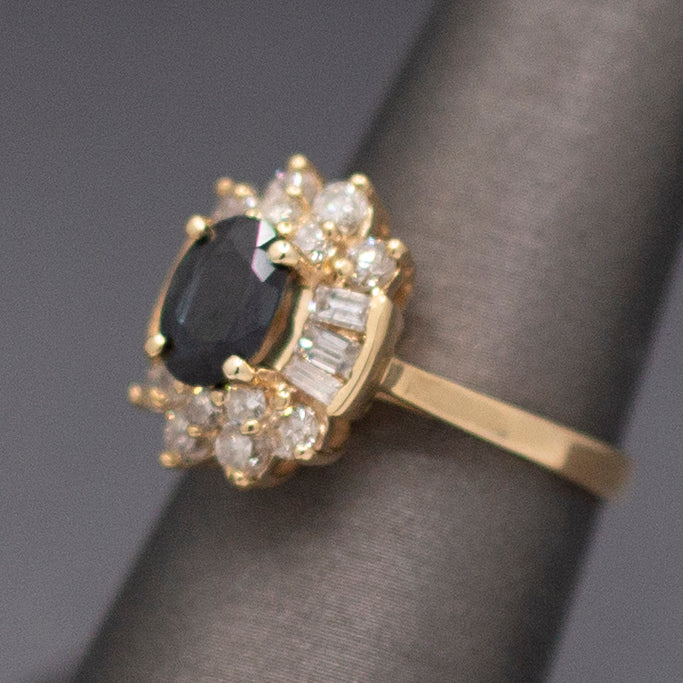 Midnight Blue Sapphire with Round and Baguette Cut Diamonds Ring in 14k Yellow Gold