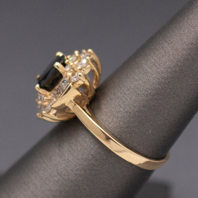 Midnight Blue Sapphire with Round and Baguette Cut Diamonds Ring in 14k Yellow Gold