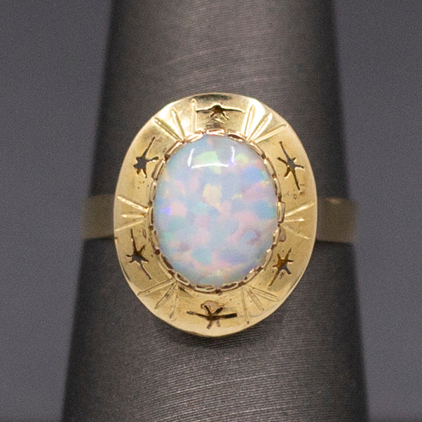 Exceptional Mesmerizing Colorful Opal Ring with Star Detail in 14k Yellow Gold
