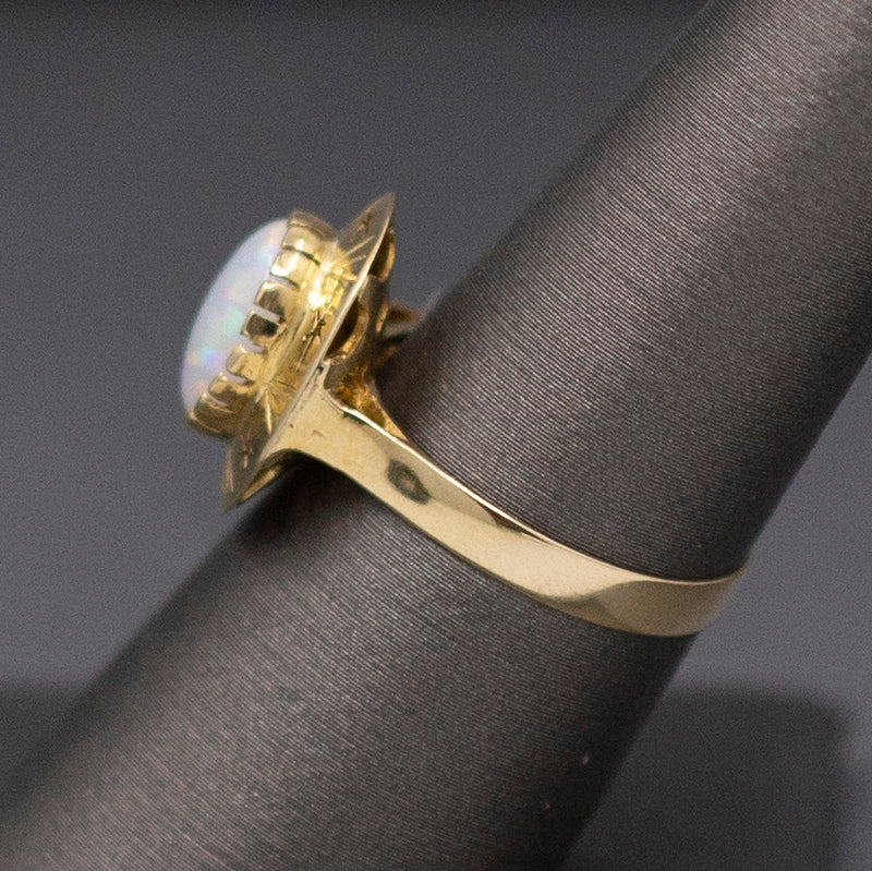 Exceptional Mesmerizing Colorful Opal Ring with Star Detail in 14k Yellow Gold