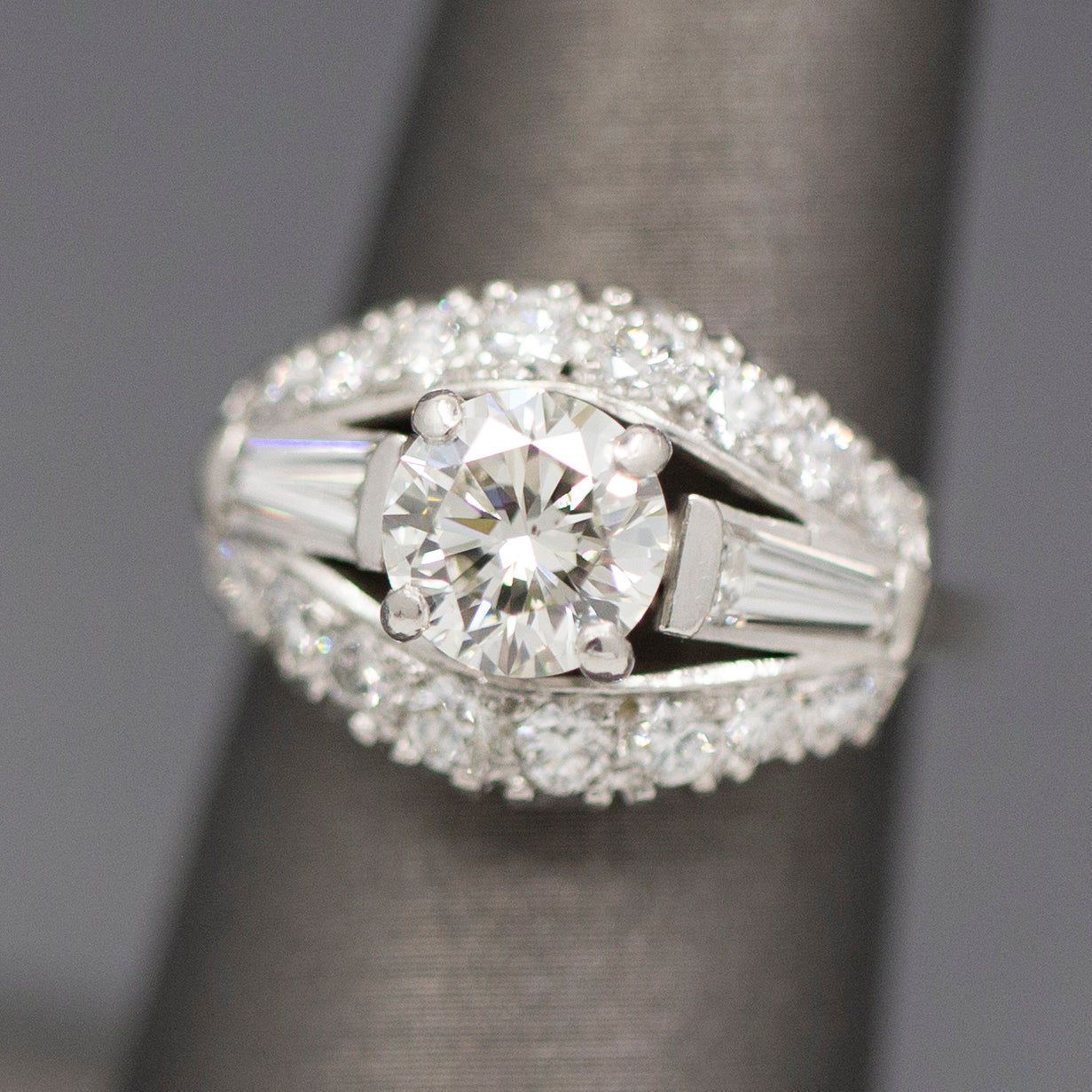 Vintage Mid-Century Round Brilliant Cut and Baguette Diamond Engagement Ring in Platinum
