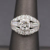 Vintage Mid-Century Round Brilliant Cut and Baguette Diamond Engagement Ring in Platinum