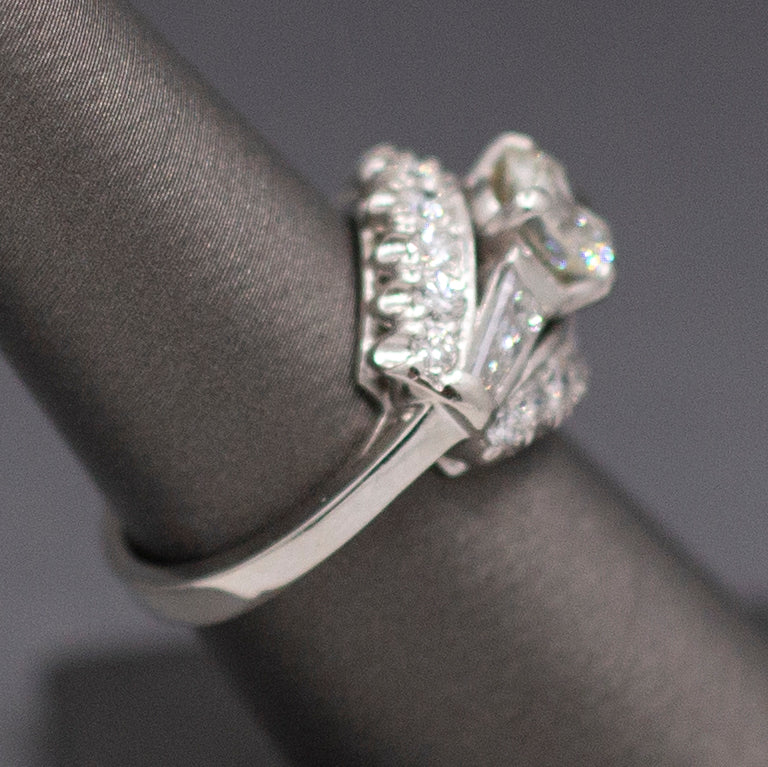 Vintage Mid-Century Round Brilliant Cut and Baguette Diamond Engagement Ring in Platinum
