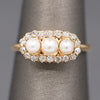 Antique Edwardian Three Stone Pearl Ring with Old Mine Cut Diamond Halo in 14k Yellow Gold