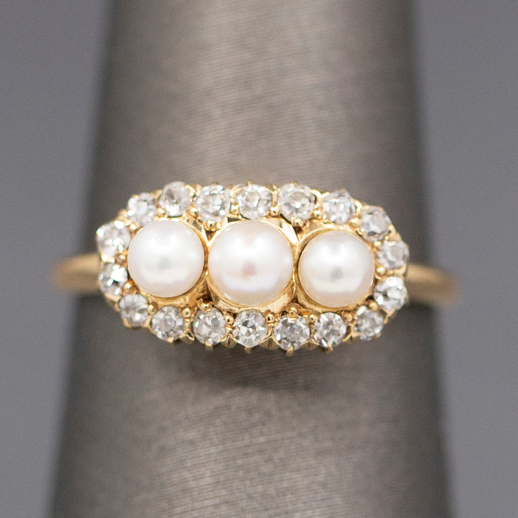 Antique Edwardian Three Stone Pearl Ring with Old Mine Cut Diamond Halo in 14k Yellow Gold