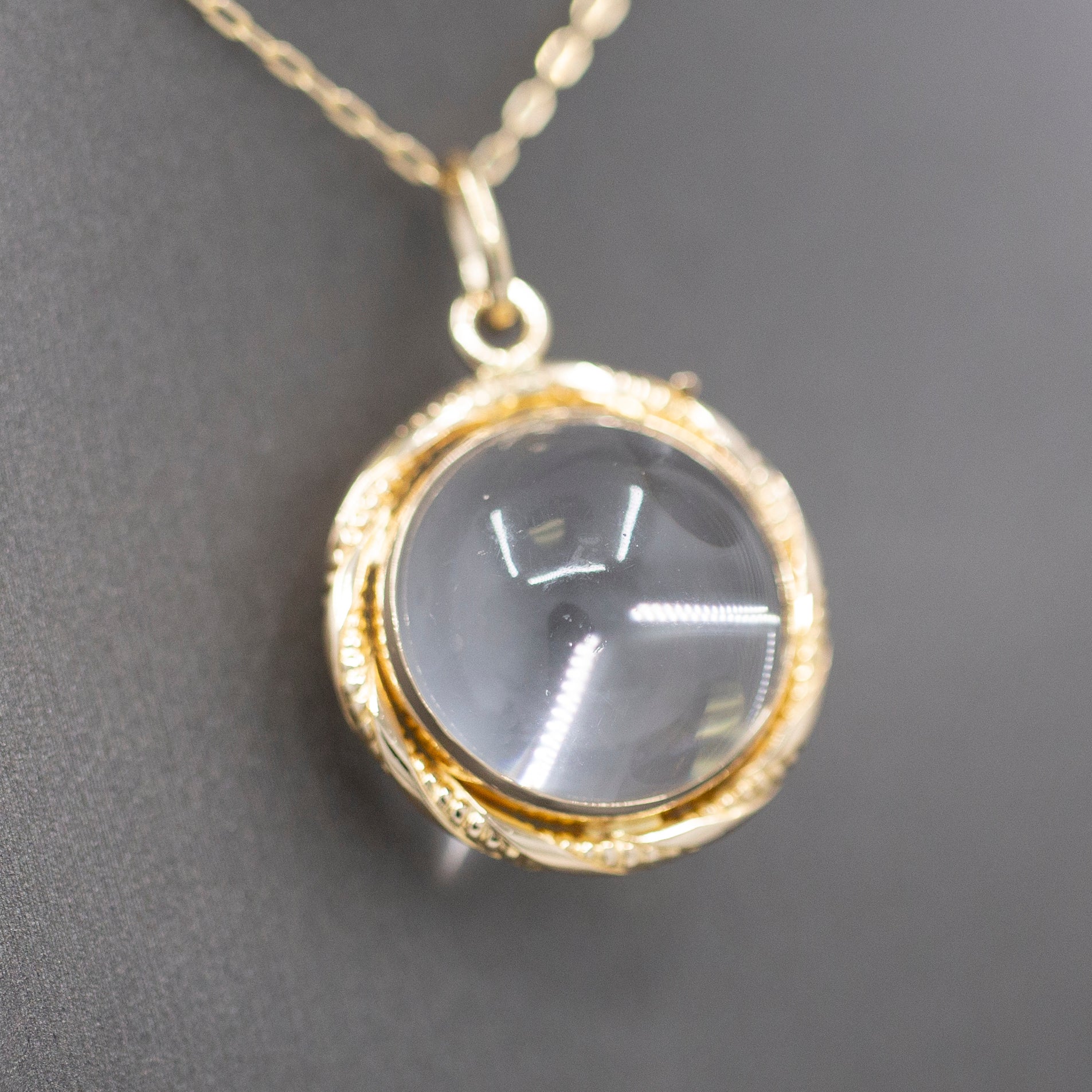 Antique Victorian Pools of Light Double Sided Rock Crystal Quartz Locket in 14k Yellow GoldAntique Victorian Pools of Light Double Sided Rock Crystal Quartz Locket in 14k Yellow Gold