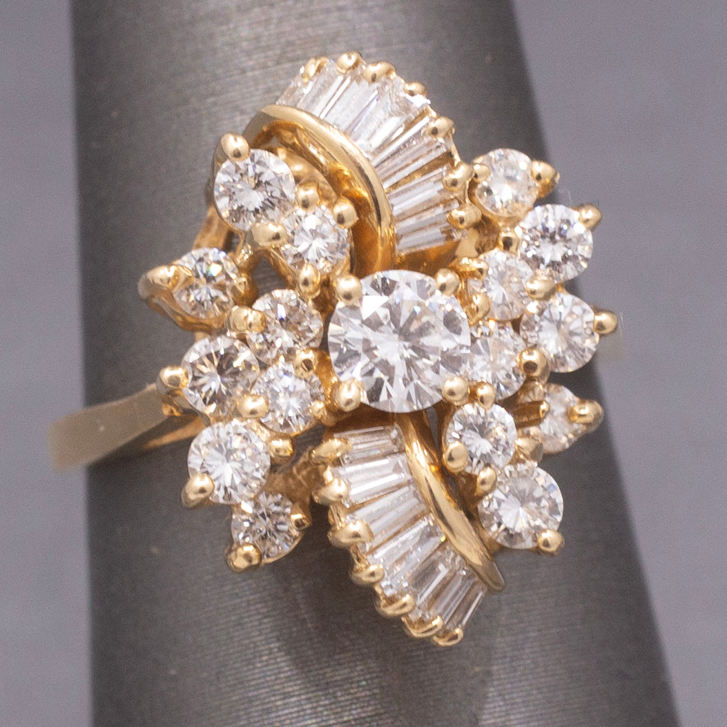 Sparkling Round and Baguette Cut Diamond Ribbon Ring in 14k Yellow Gold