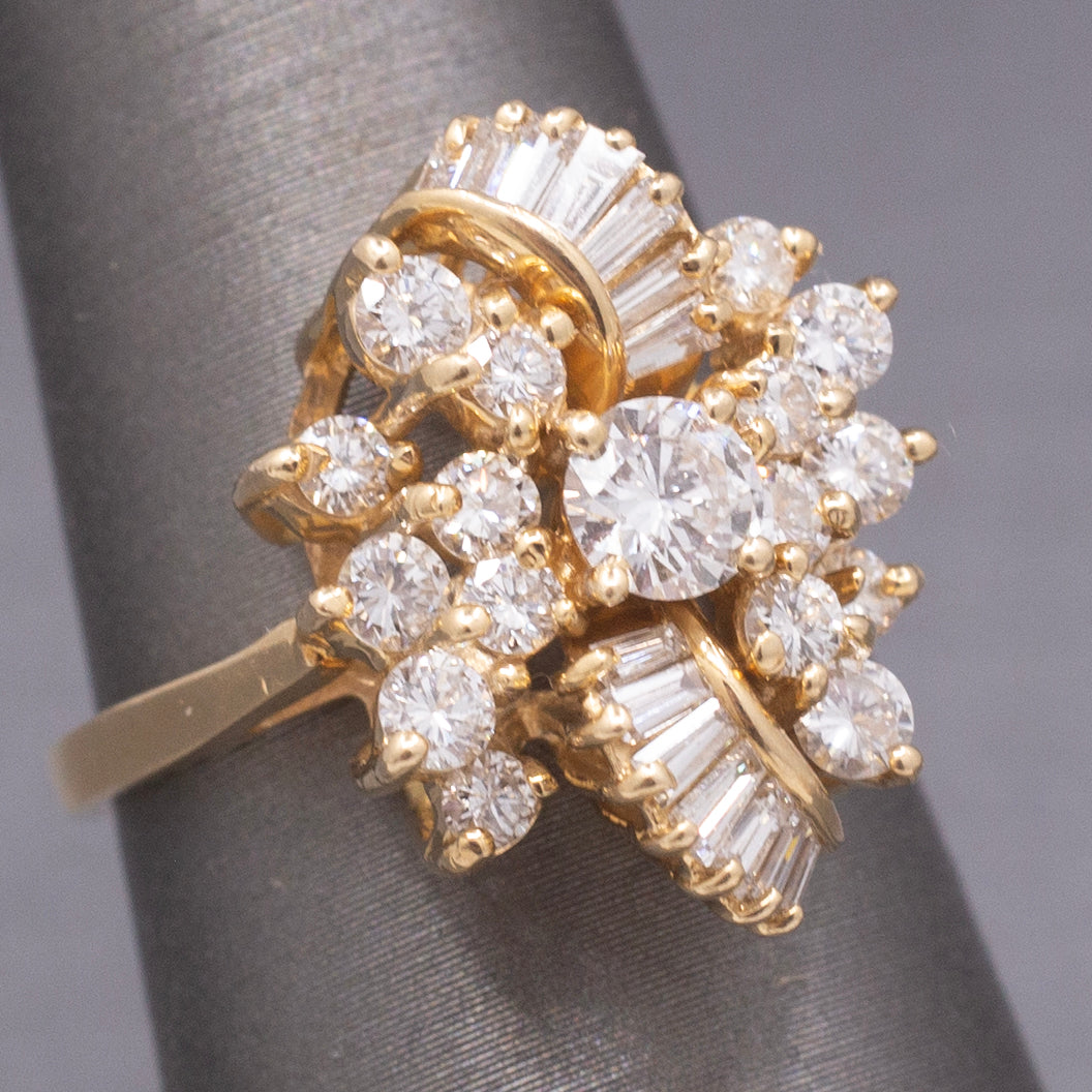 Sparkling Round and Baguette Cut Diamond Ribbon Ring in 14k Yellow Gold