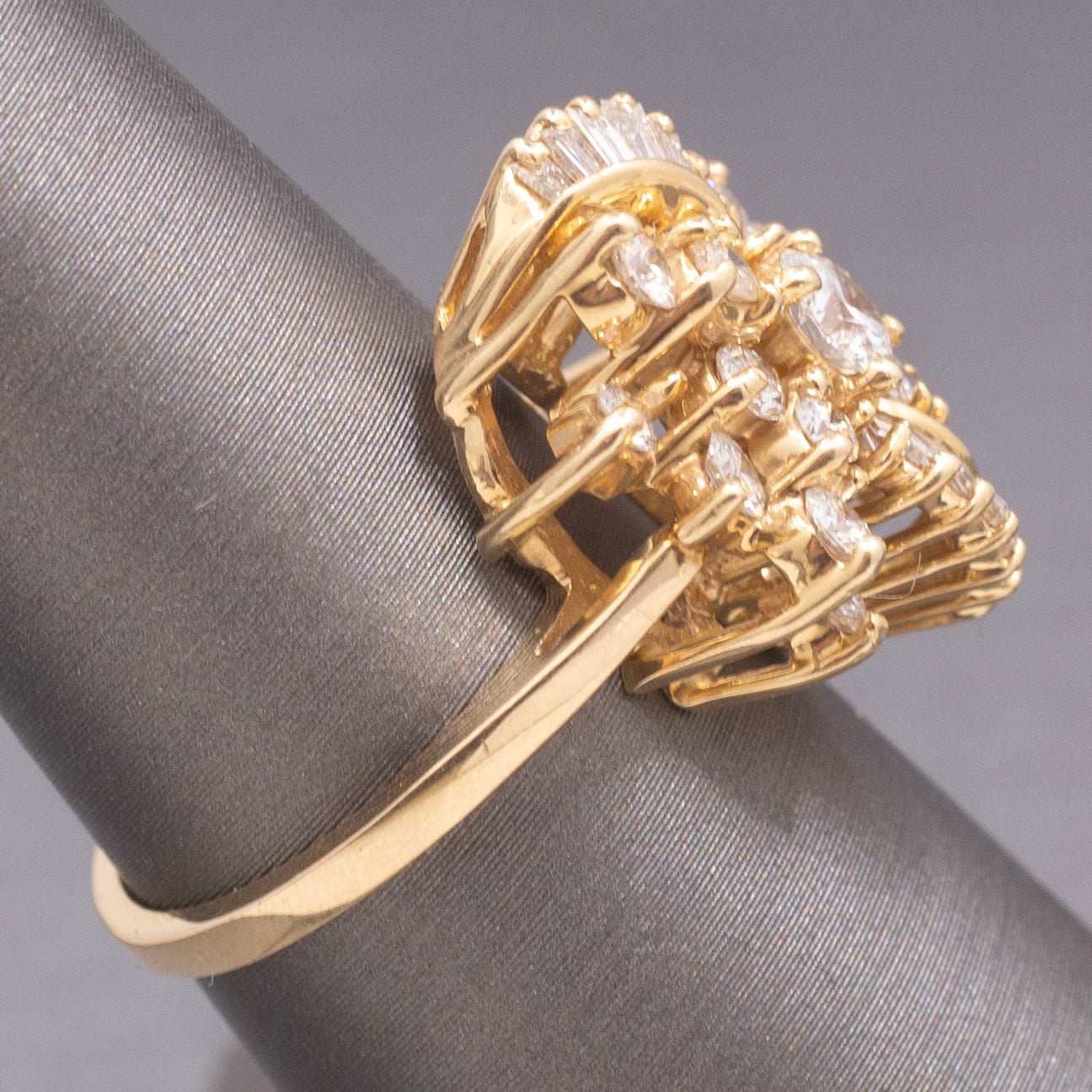 Sparkling Round and Baguette Cut Diamond Ribbon Ring in 14k Yellow Gold