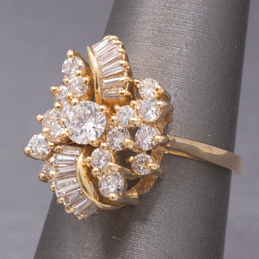 Sparkling Round and Baguette Cut Diamond Ribbon Ring in 14k Yellow Gold