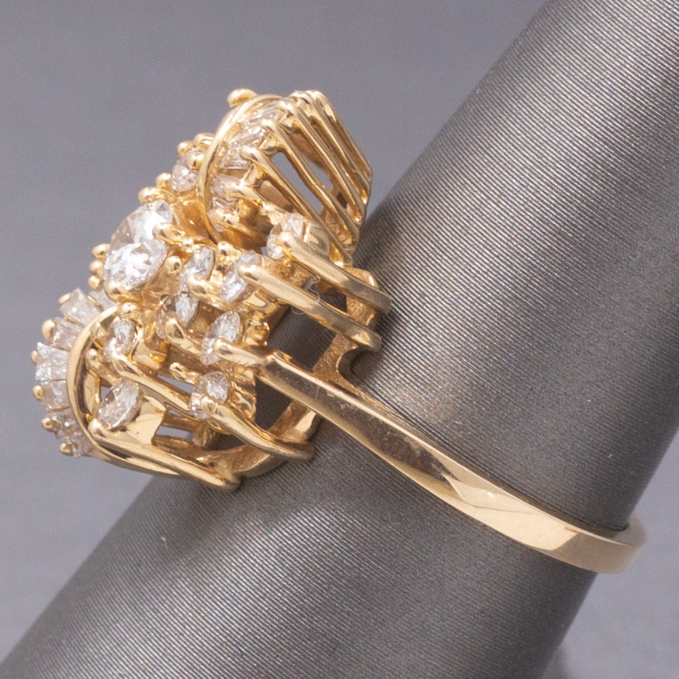 Sparkling Round and Baguette Cut Diamond Ribbon Ring in 14k Yellow Gold