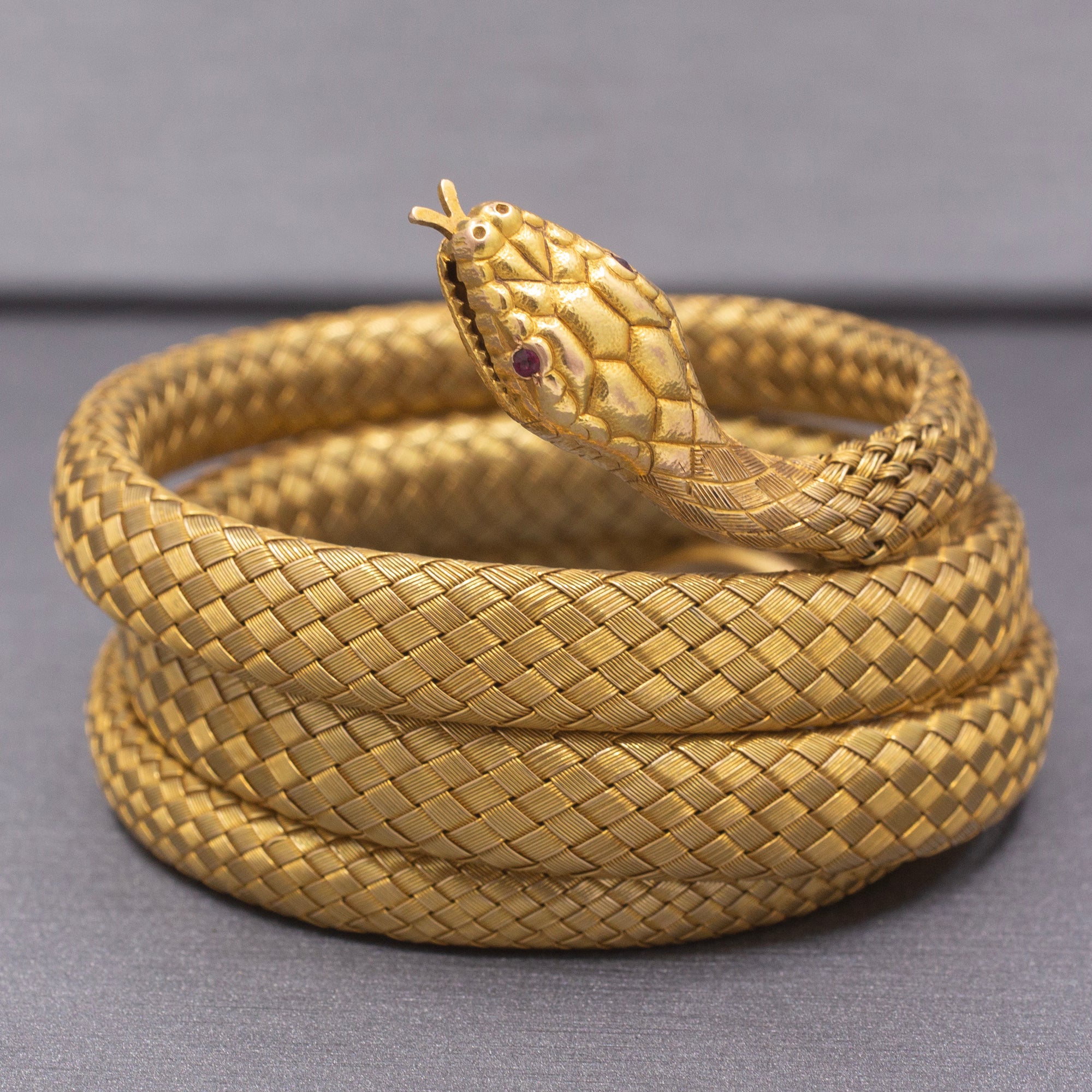
Magnificent Antique Victorian Snake Wrap Bracelet in 18k Yellow Gold with Ruby Eyes
