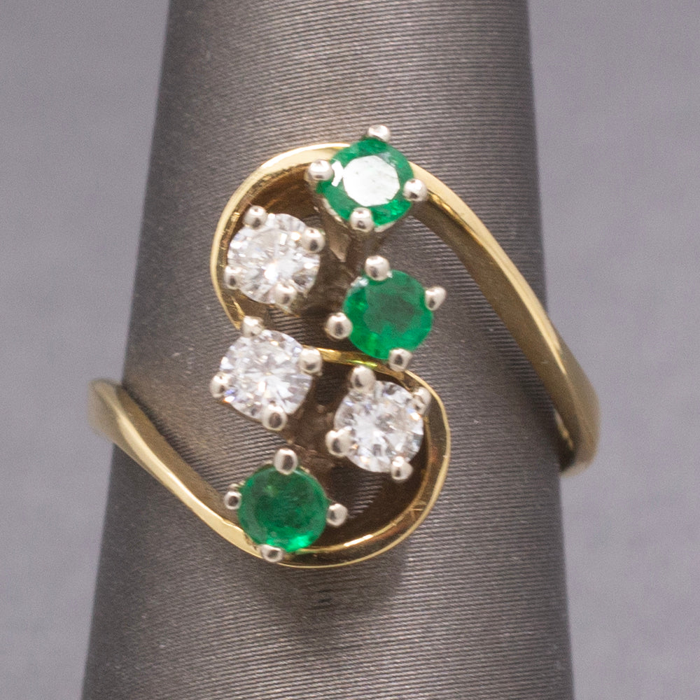 Elegant Emerald and Diamond Cluster Bypass Swirl Ring in 18k Yellow Gold