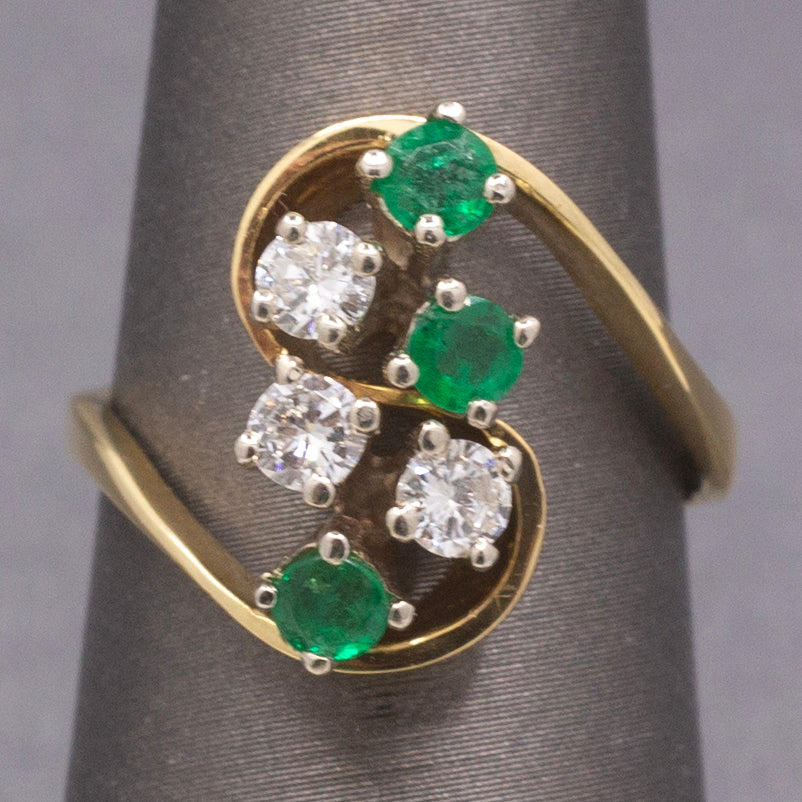 Elegant Emerald and Diamond Cluster Bypass Swirl Ring in 18k Yellow Gold