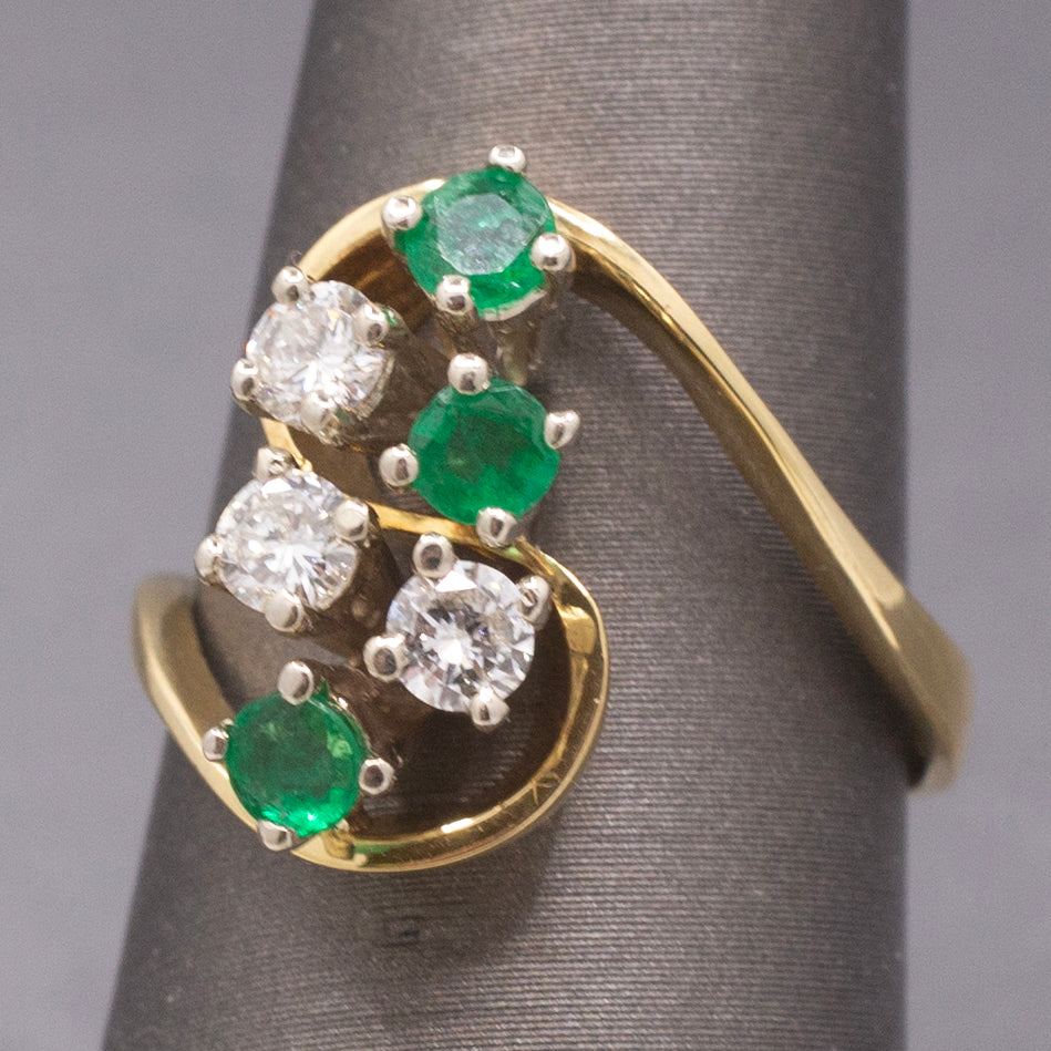 Elegant Emerald and Diamond Cluster Bypass Swirl Ring in 18k Yellow Gold