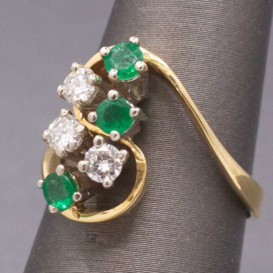 Elegant Emerald and Diamond Cluster Bypass Swirl Ring in 18k Yellow Gold