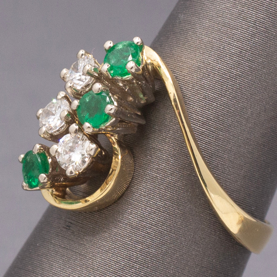 Elegant Emerald and Diamond Cluster Bypass Swirl Ring in 18k Yellow Gold