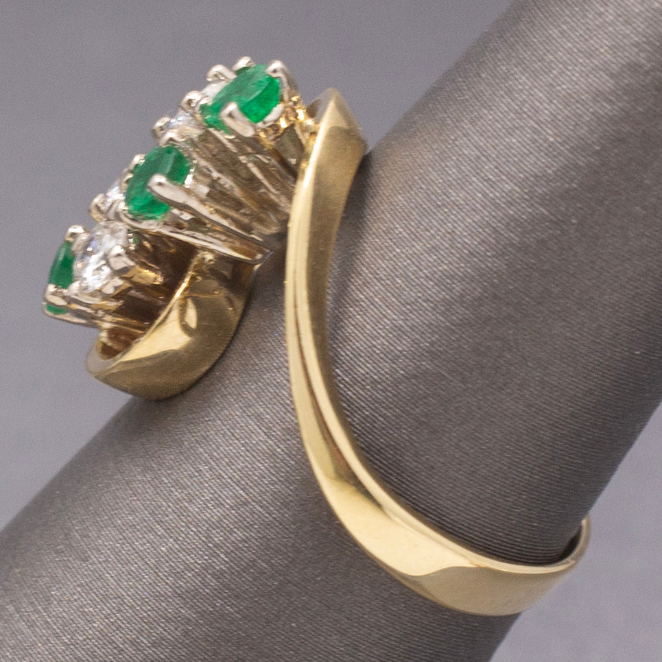 Elegant Emerald and Diamond Cluster Bypass Swirl Ring in 18k Yellow Gold