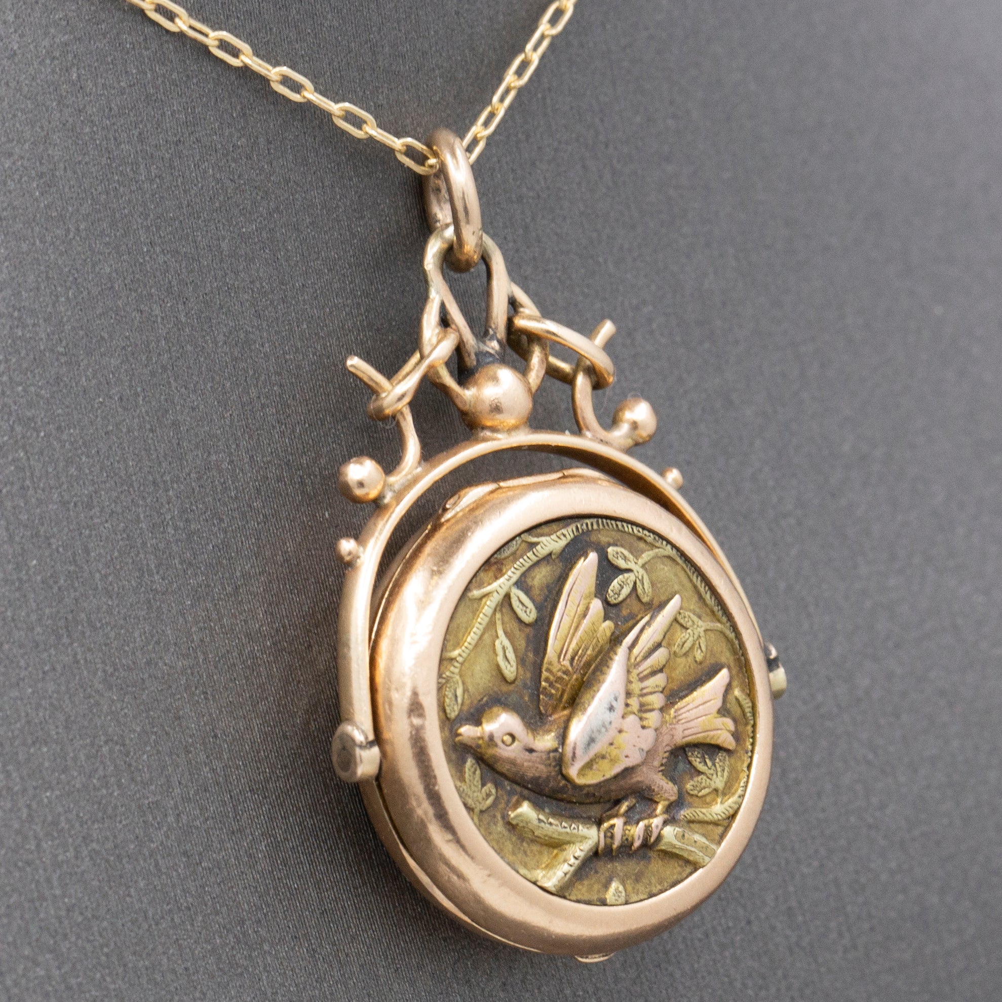 Antique Victorian Spinning Bird Onyx Locket in 14k Rose Gold