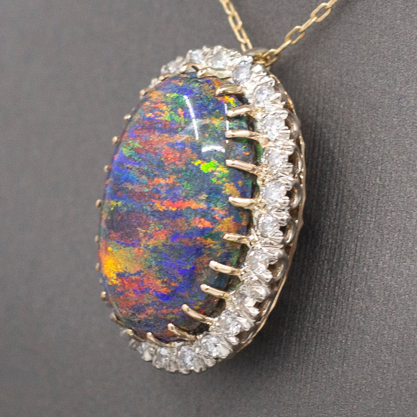 Exquisite Black Opal and Diamond Convertible Ring to Pendant in 14k White Gold