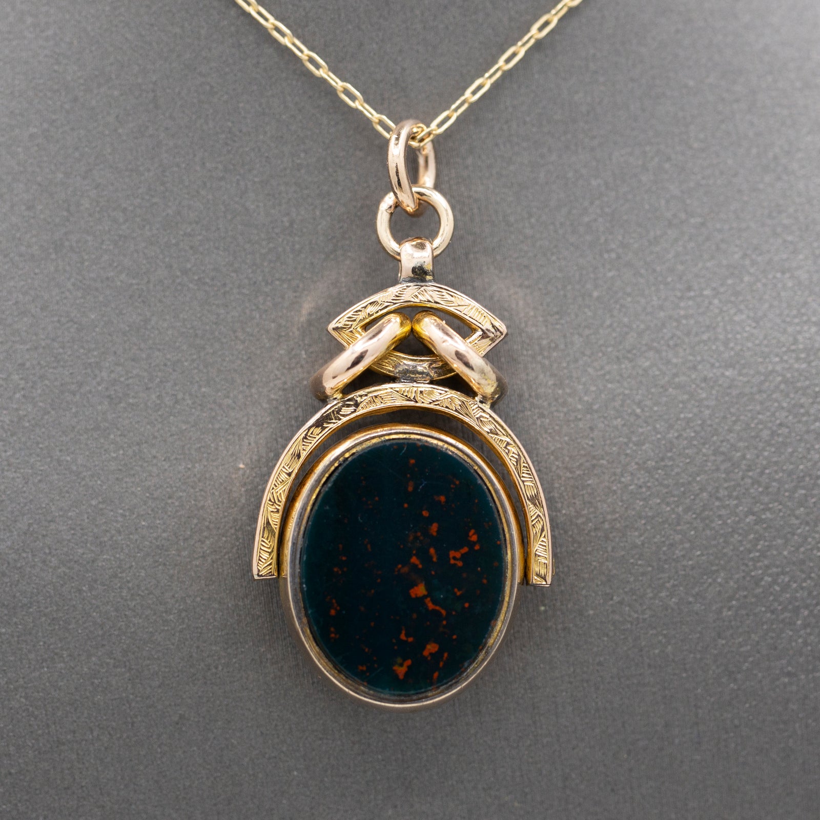 Antique Victorian Spinning Oval Bloodstone and Onyx Fob Pendant in 10k Yellow Gold