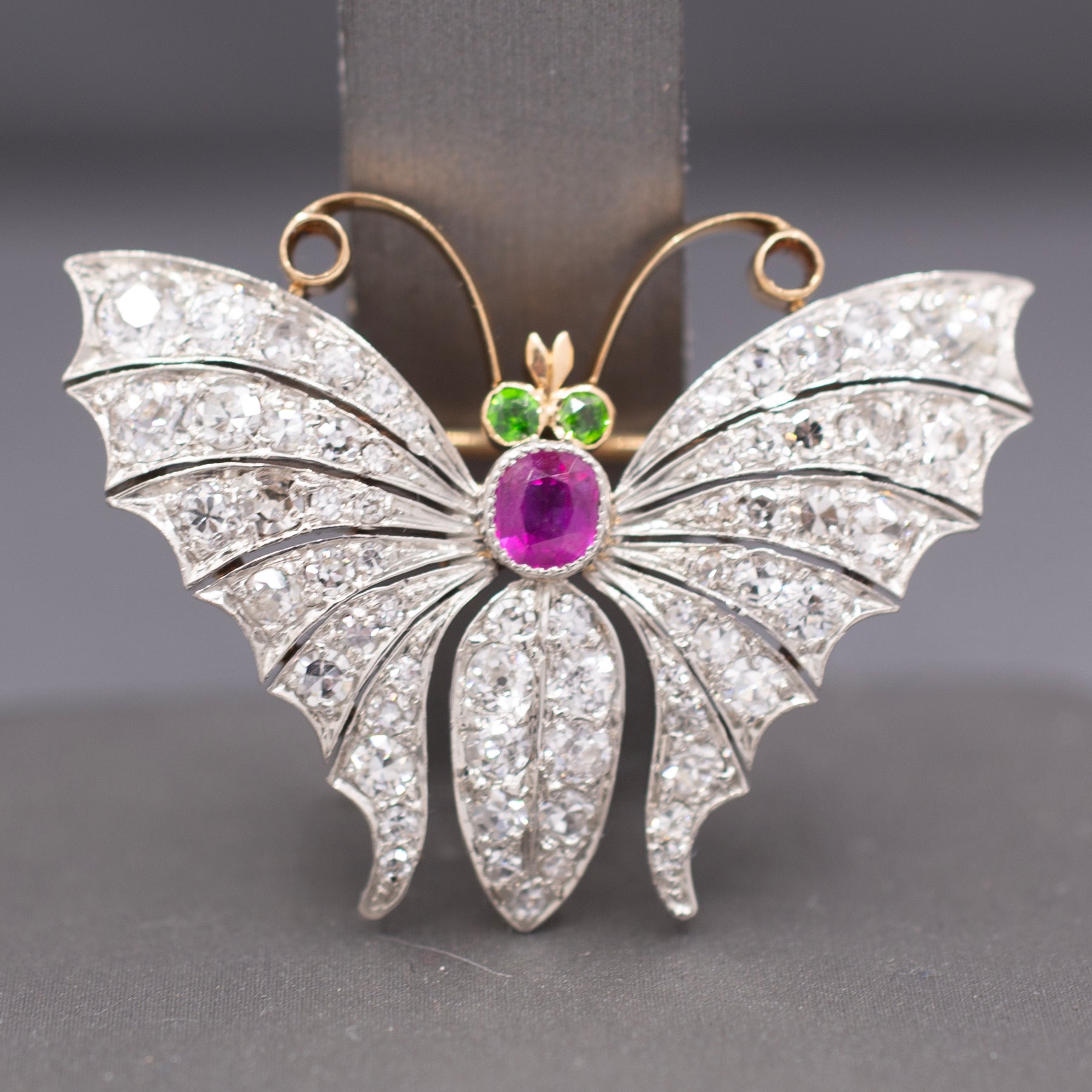 Exquisite Edwardian Butterfly Brooch with Ruby Demantoid Garnet and Old Cut Diamond in 18k and Platinum