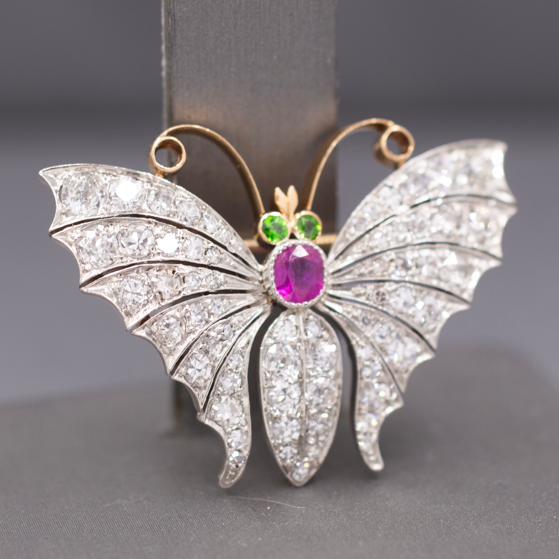 Exquisite Edwardian Butterfly Brooch with Ruby Demantoid Garnet and Old Cut Diamond in 18k and Platinum