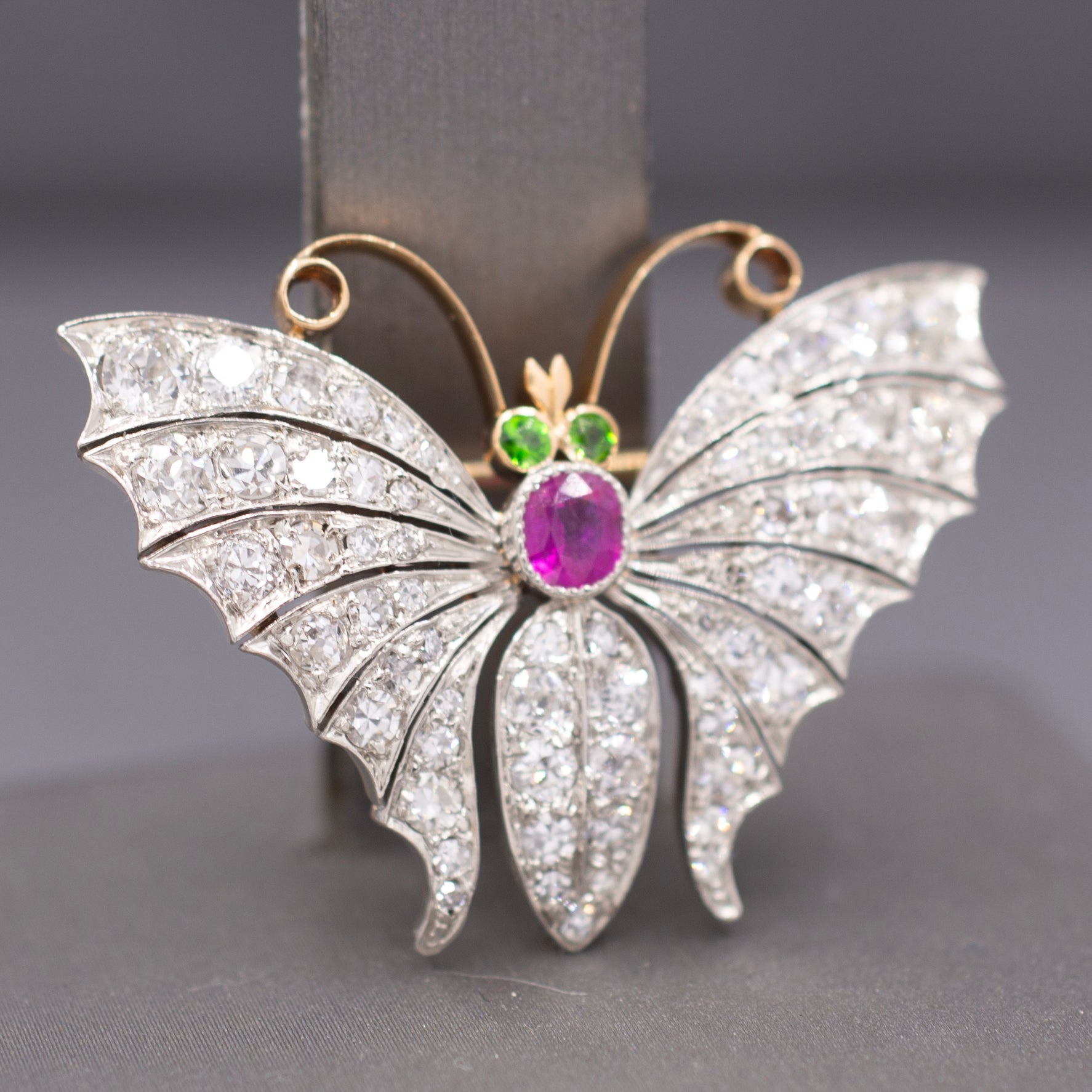 Exquisite Edwardian Butterfly Brooch with Ruby Demantoid Garnet and Old Cut Diamond in 18k and Platinum