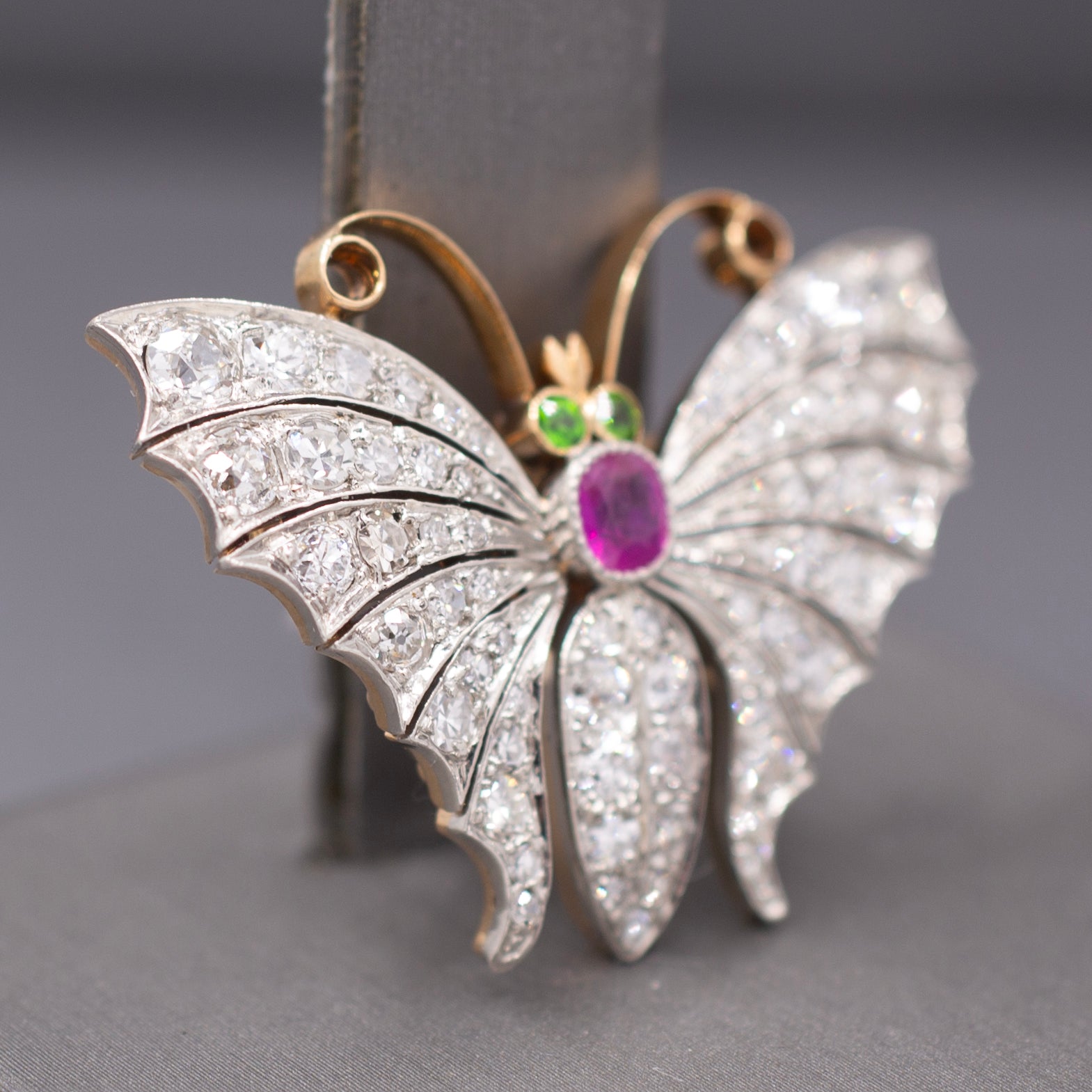 Exquisite Edwardian Butterfly Brooch with Ruby Demantoid Garnet and Old Cut Diamond in 18k and Platinum