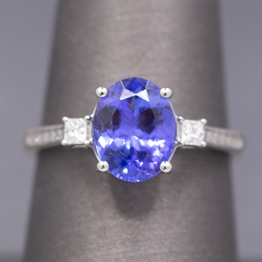 Vivid Oval Cut Tanzanite and Diamond Ring in Platinum