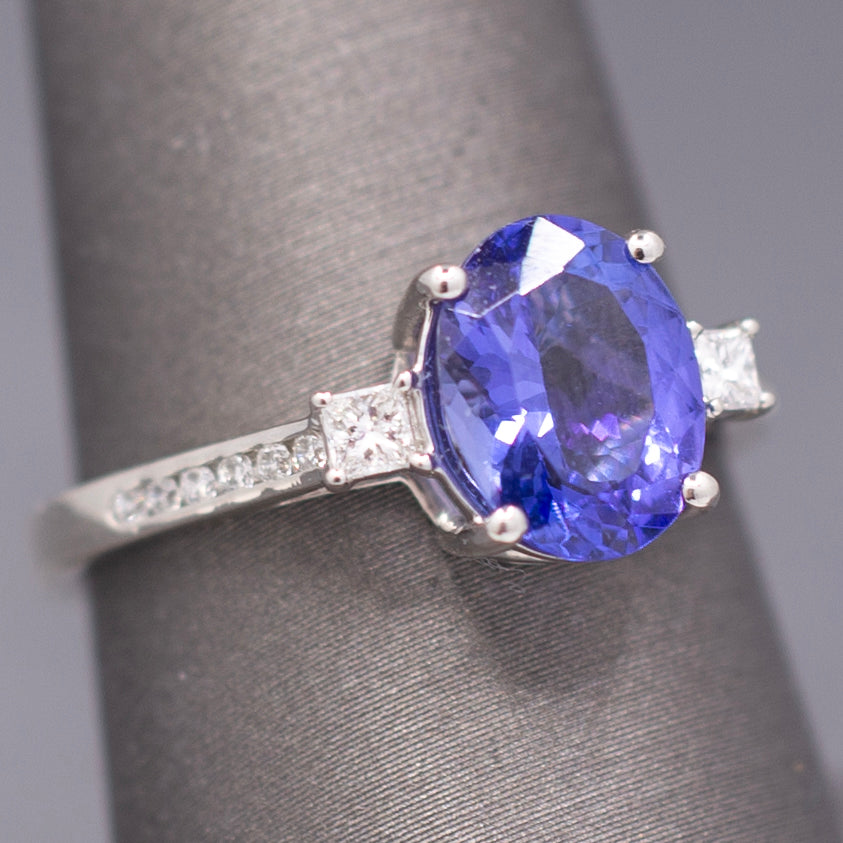Vivid Oval Cut Tanzanite and Diamond Ring in Platinum