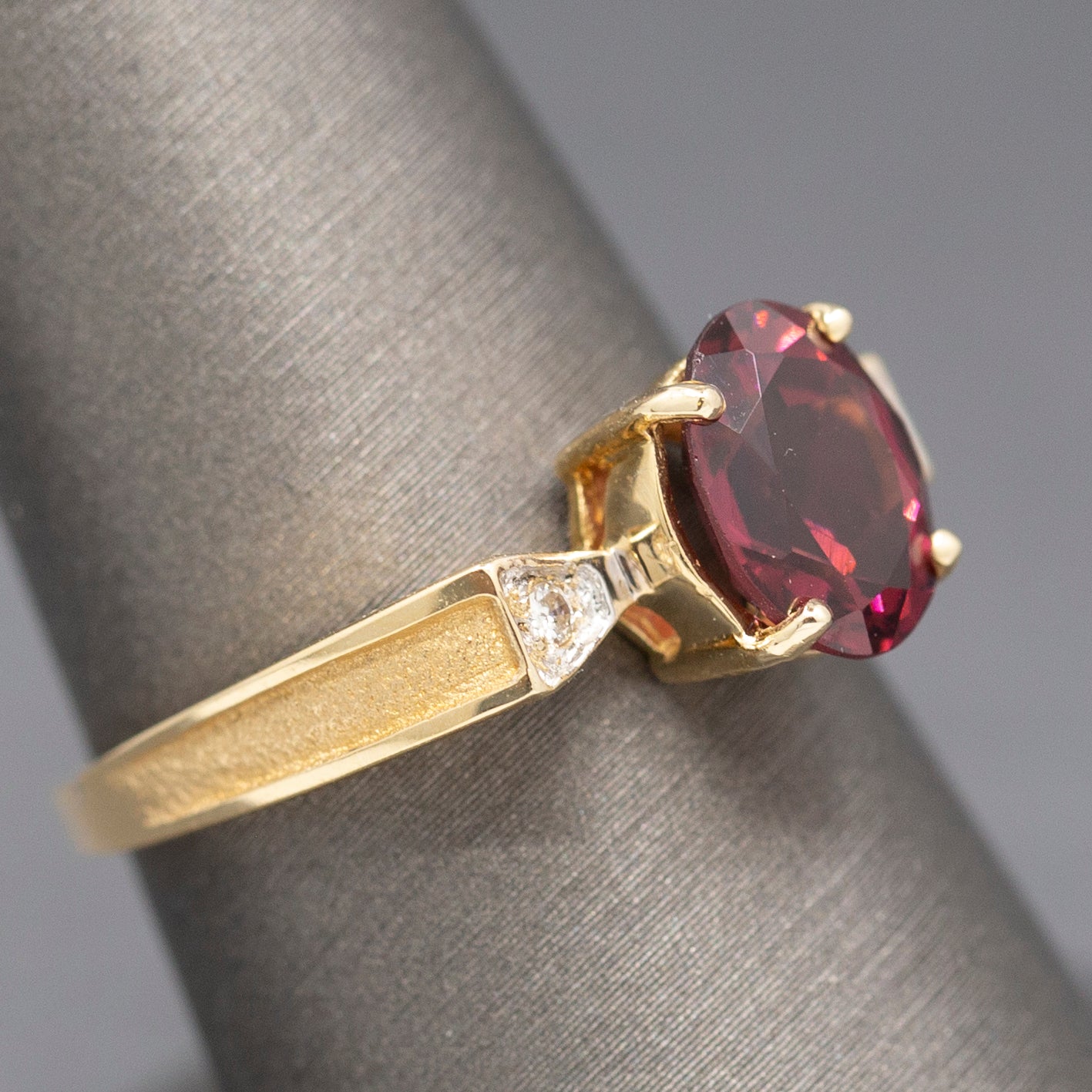 Ravishing Rhodolite Garnet and Diamond Accent Bow Ring in 14k Yellow Gold