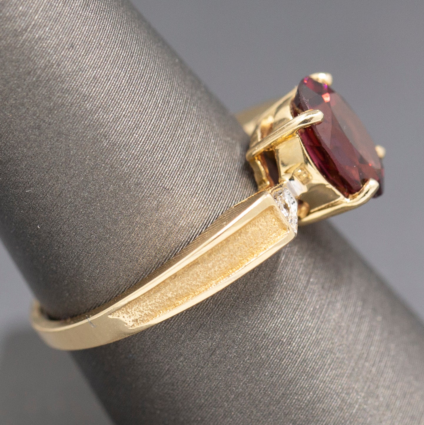 Ravishing Rhodolite Garnet and Diamond Accent Bow Ring in 14k Yellow Gold