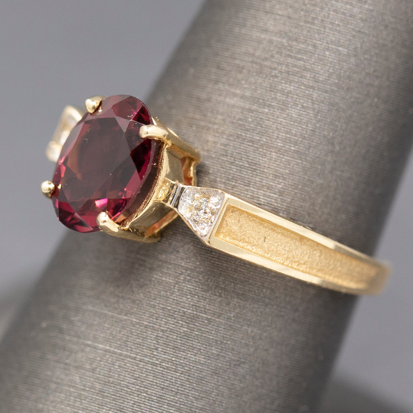 Ravishing Rhodolite Garnet and Diamond Accent Bow Ring in 14k Yellow Gold