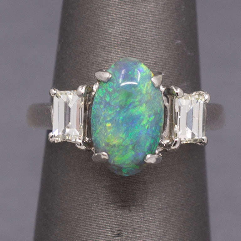 Exquisite Black Opal and Trapezoid Cut Diamond Three Stone Ring in Platinum