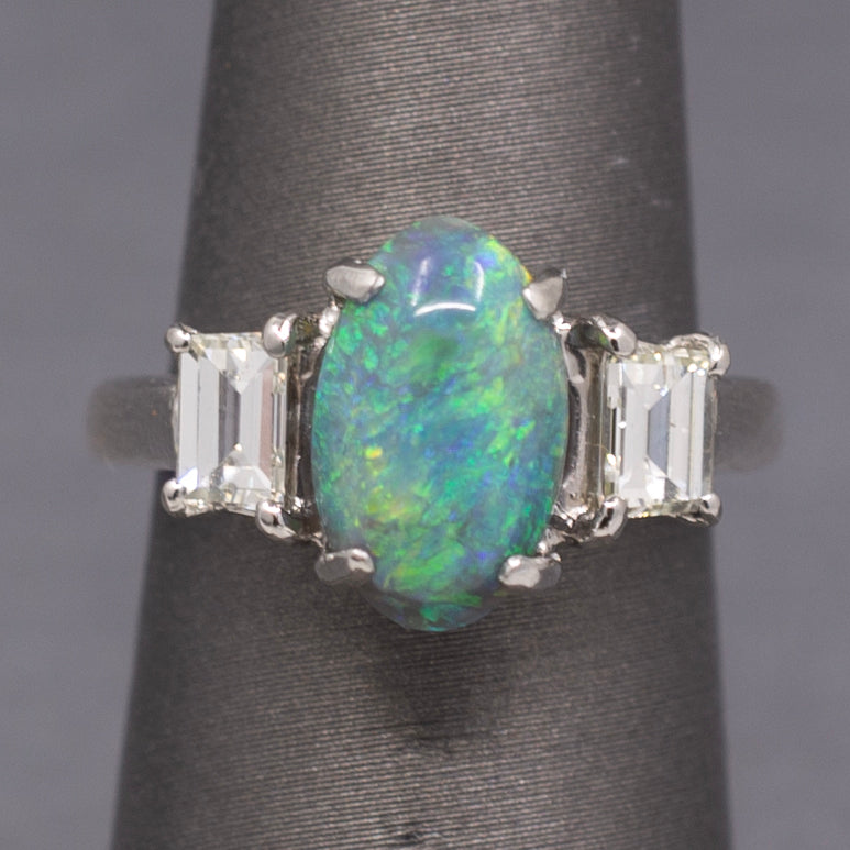 Exquisite Black Opal and Trapezoid Cut Diamond Three Stone Ring in Platinum